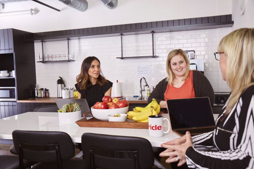 The InStride team working in the company's office