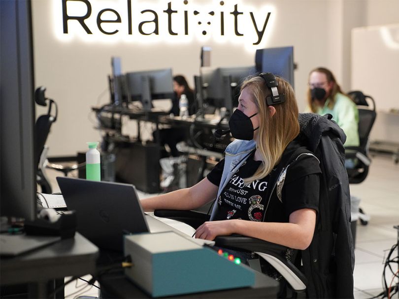 People work at computers in the office.