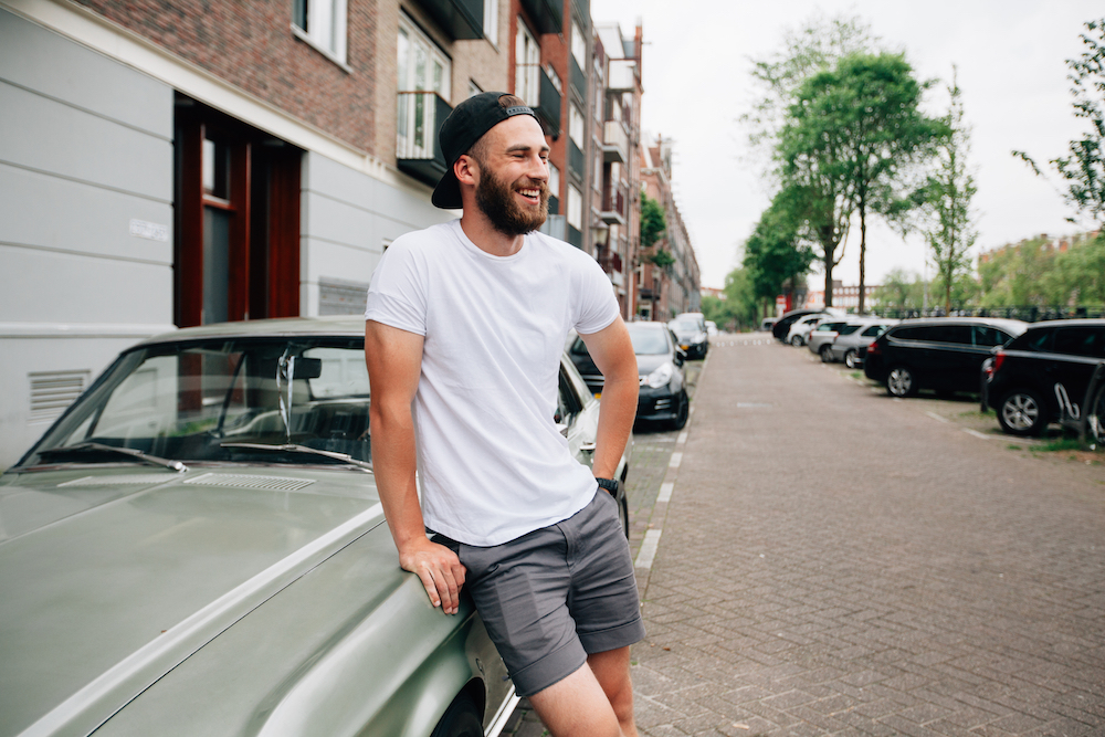 A man wearing a white cotton shirt