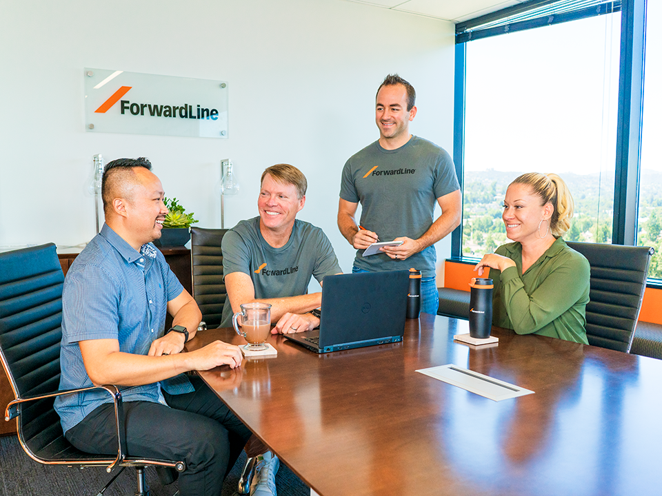 Forwardline employees working together 