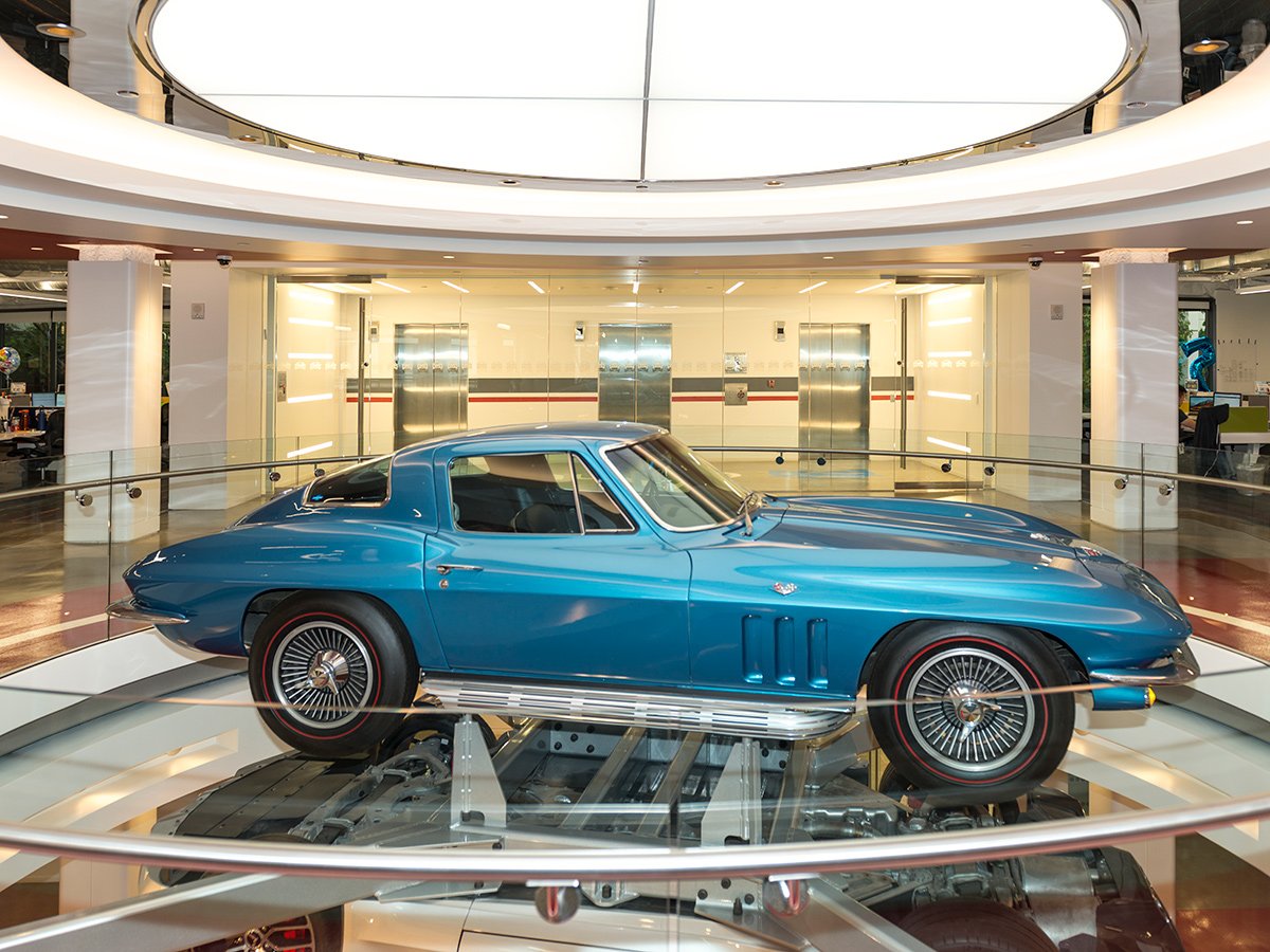 A blue Corvette inside of the Edmunds office