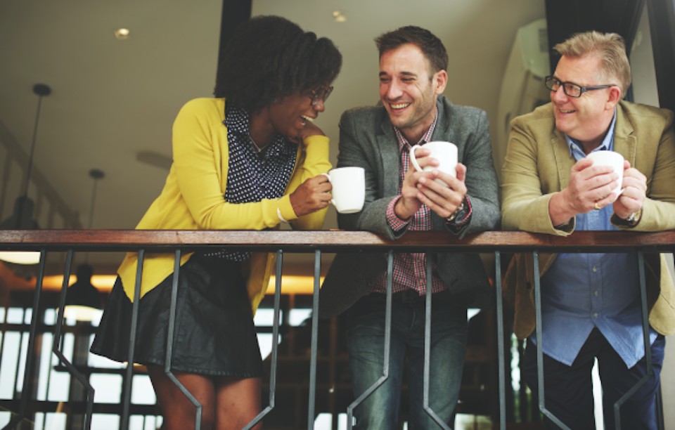 Employees share coffee