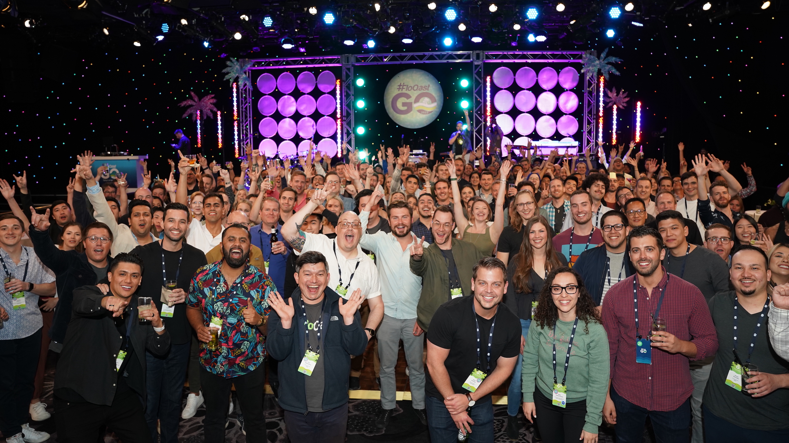 FloQast team members at an event.