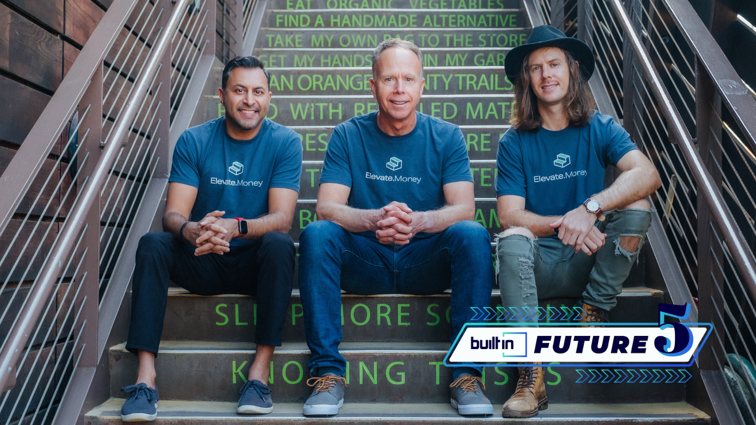 The Elevate Money founding team sits on a flight of stairs for a photo