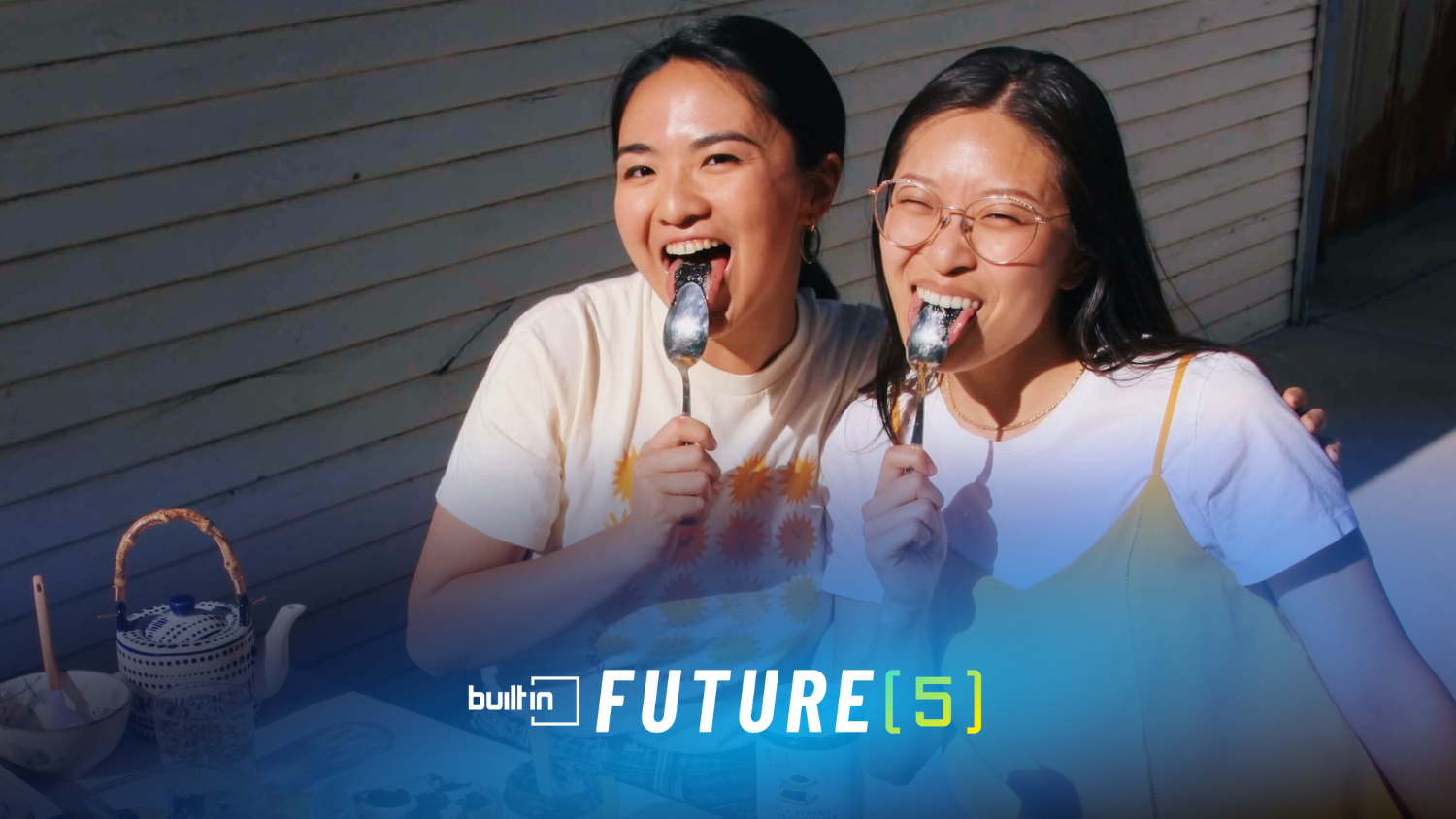 Rooted Fare’s co-founders Hedy Yu and Ashley Xie enjoy spoonfuls of Black Sesame Crunchy Butter