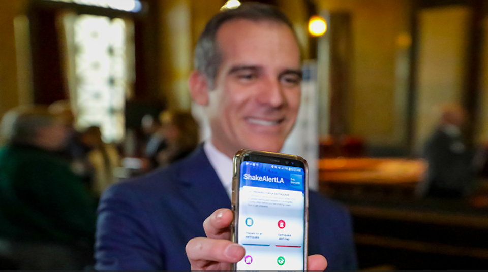 Los Angeles mayor Eric Garcetti displaying new ShakeAlertLA app
