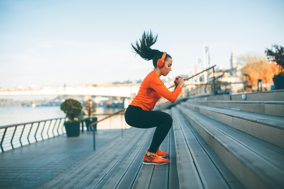 Woman working out near beach