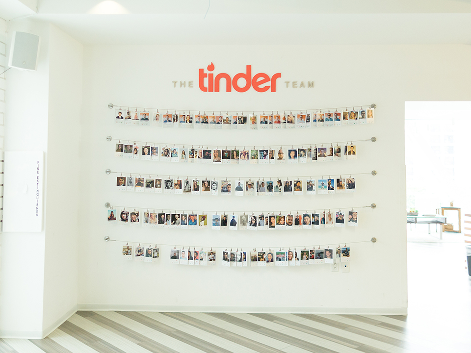 Photos of Tinder's team on a wall in their LA office