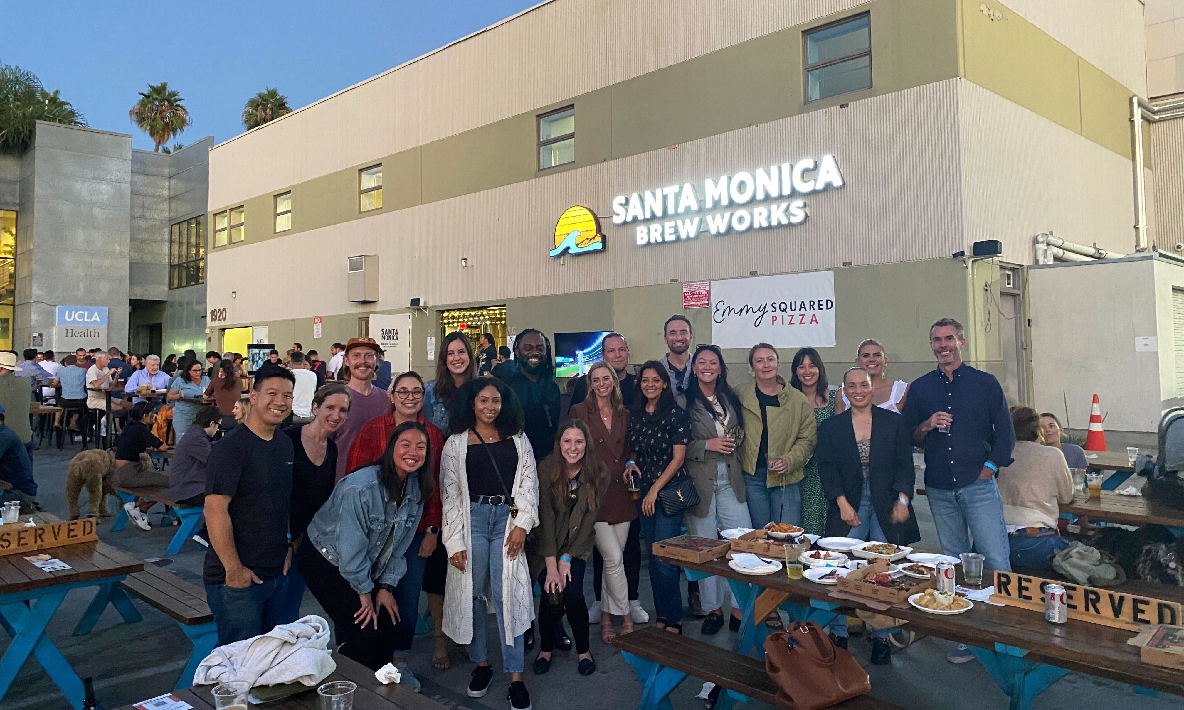 Team members gather at Santa Monica Brew Works for a happy hour gathering.