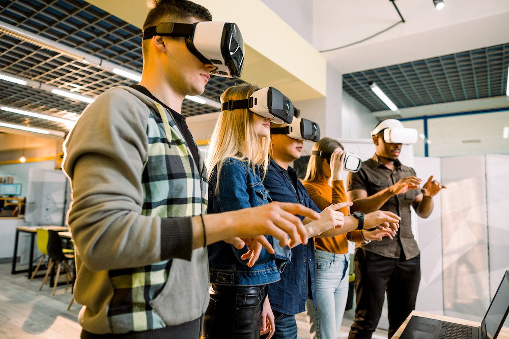 A group of people in VR goggles