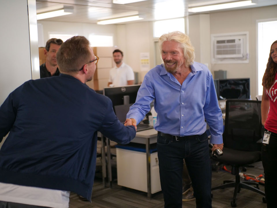 Will shaking hands with Richard Branson in Virgin Orbit office