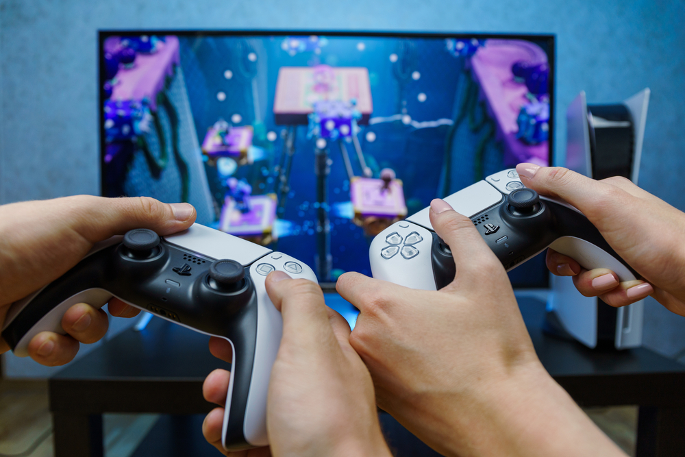 two people playing playstation