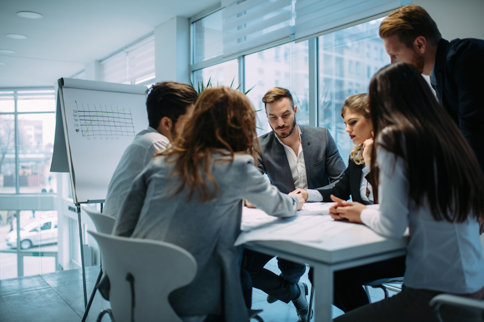 professionals collaborating stock photo