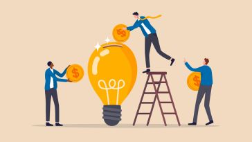 Illustration of businessman putting coins into a lightbulb depicting investing in a startup idea