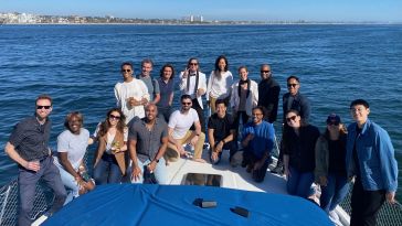  The Black Tux team members on a boat ride outing. 