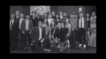The Cie team poses for a large group photo. 
