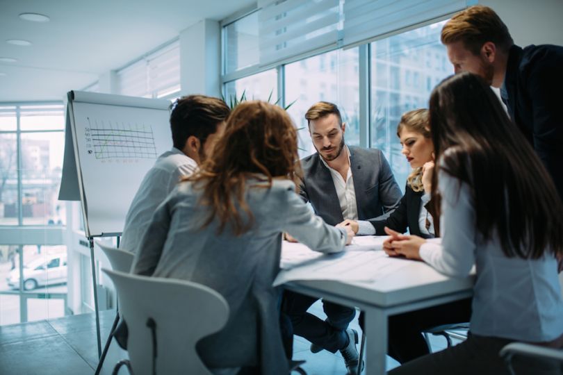 professionals collaborating stock photo