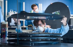 Aerospace Corporation researchers in the xLab assembling DiskSat