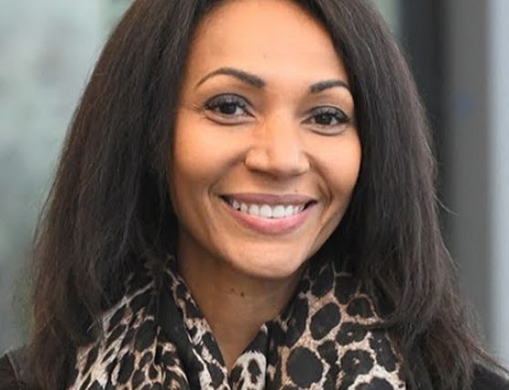 Yameogo-Stanzler wears a leopard-print scarf.